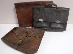 Three vintage leather satchels