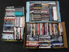 Three boxes containing assorted DVD's, Blu Rays,