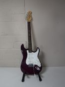 A Liberty electric guitar on stand