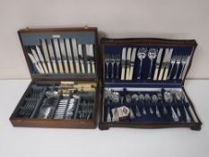 Two oak canteens of cutlery