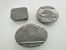 Three antique pewter snuff boxes