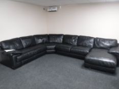 A Italisofa seven seater black leather corner settee together with a swivel adjustable armchair