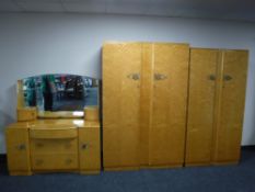 A three piece Maple bedroom suite