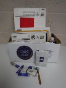 A box containing artist's drawing books and supplies