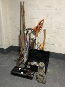 Two plastic tubs containing a Stihl FSE 41 electric strimmer,