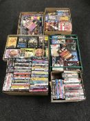 Eight boxes containing assorted DVD's and CD's