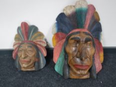 Two painted wooden busts of Native Americans