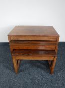 A nest of three Danish tables