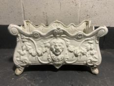 A 20th century cast iron Louis XV style lion mask planter