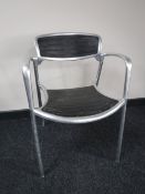 A metal framed Toledo armchair design by Jorge Pensi for Amat