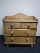 A Victorian pine four drawer chest