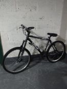 An orange Gringo front suspension mountain bike