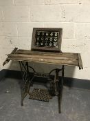 A Singer sewing machine table together with a bell box