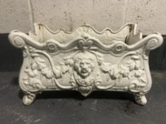 A 20th century cast iron Louis XV style lion mask planter