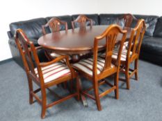 A mahogany Regency style mahogany dining table with leaf,
