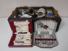 A box containing brass barley twist candlesticks, T G Green butter dish and cover, cased cutlery,