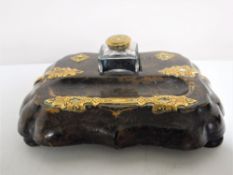A Victorian papier mache desk stand