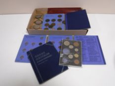 A box containing a quantity of pre-decimal copper coinage with albums,