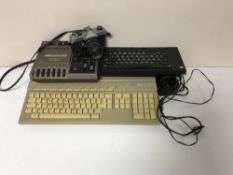 A box containing an Atari 520ST together with data recorder deck,
