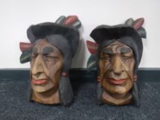 Two painted wooden busts of Native Americans