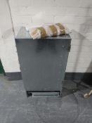 A galvanized steel smoking cabinet