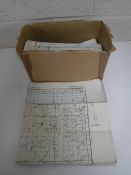 A box containing wartime maps