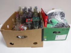 Two boxes containing pub related items including bottles, glassware, miniatures,