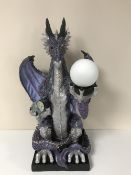 A large contemporary table lamp of a dragon
