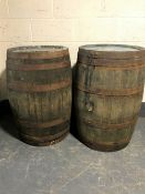 Two large old coopered wooden barrels stencilled Laphroaig Malt whisky,