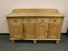 A Victorian pine side board,