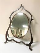 A rare shaped mahogany table top Regency cheval mirror circa 1820