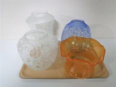 A tray containing four Victorian glass oil lamp shades