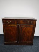 A Victorian mahogany double door cupboard fitted a drawer CONDITION REPORT: 86cm