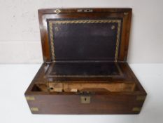 A Victorian walnut brass bound writing box