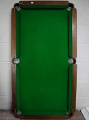 An antique 4' slate bed table top snooker table