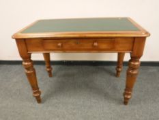 A Victorian stained pine desk fitted with a drawer,
