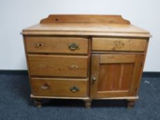 A Victorian pine low sideboard/cupboard