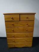 A pine seven drawer chest
