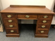 A Victorian inlaid mahogany pedestal desk,