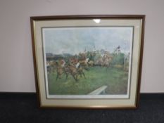 A framed Michael Lyne print 'First Time Round Beacher's Brook (The Grand National 1969)'