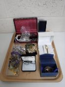 A tray containing a collection of costume and sterling silver jewellery including pendants and