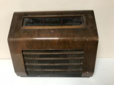 An early 20th century walnut cased KB valve radio