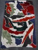 Three 20th century woollen rugs CONDITION REPORT: Good condition. All modern.
