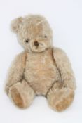 A vintage jointed mohair teddy bear with growler, height 50cm.