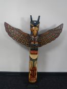A painted wooden Totem pole CONDITION REPORT: This is modern. It is 102cm high.