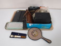 A tray of a small collection of cameras, cut throat and rolls razor, drawing instruments in case,