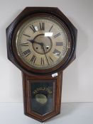 An antique mahogany regulator wall clock