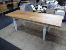 A continental oak coffee table on painted base