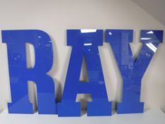 A quantity of blue acrylic letters