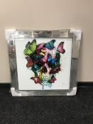 Two contemporary Murciano pictures of skulls in mirrored frames